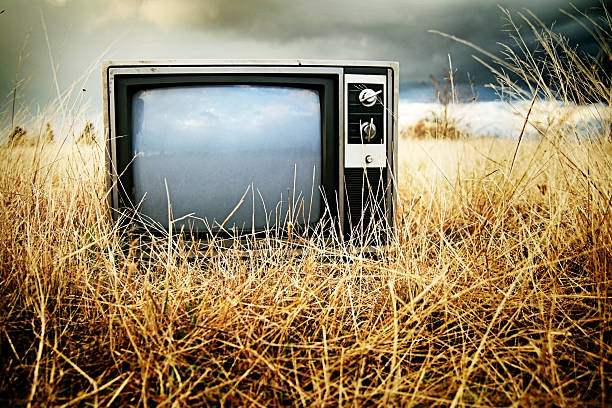 istock Abandoned Television In A Field with Copy Space 108195538