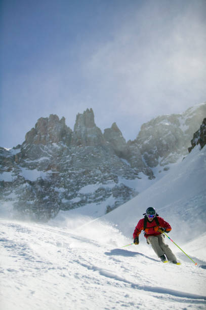 istock Male skier with mountain background 108195630