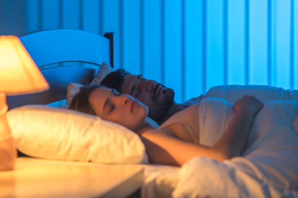 istock The sleeping lovers on the bed. night time 1081960576