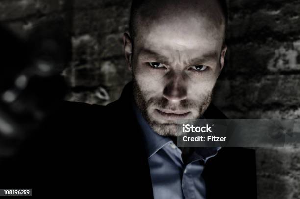 Portrait Of Man Standing Beside Brick Wall Stock Photo - Download Image Now - Adult, Adults Only, Balding