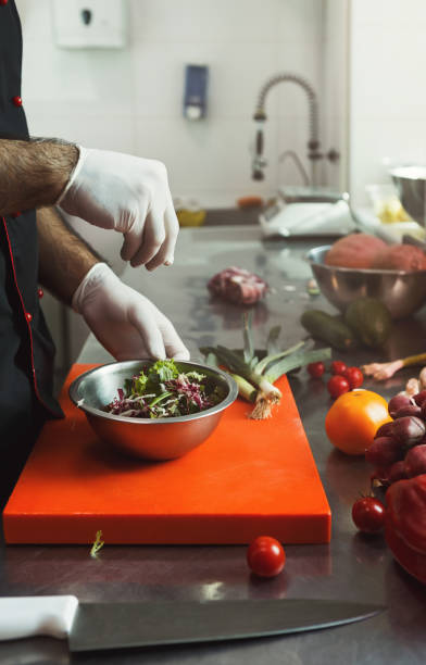 istock Chef making fresh vegetables mix salad 1081964420