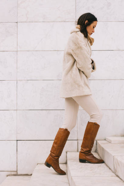Woman walking up the stairs