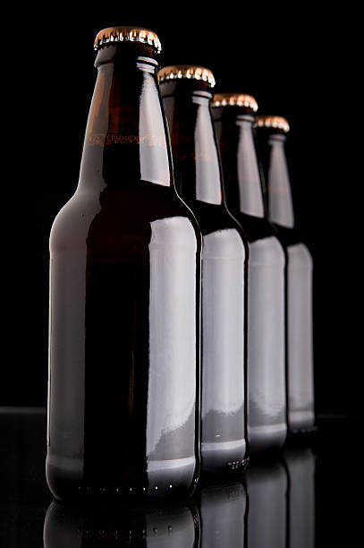 Cold Beer Bottles Stacked in Line stock photo