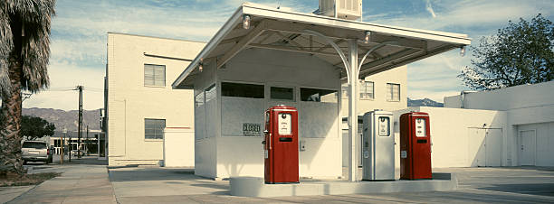 Gas Station A 1960s Southern California gas station being restored. The photo is shot with a panoramic camera (Hasselbad XPAN) and 45mm lens. vintage gas pumps stock pictures, royalty-free photos & images