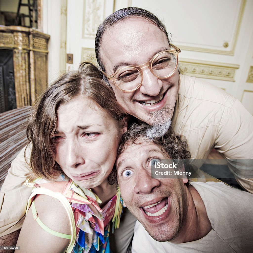 Mad Doc and Insane Patients Mad Psychologist together with his insane grimacing patients. Psychoanalysis concept shot. Series (!). Bizarre Stock Photo