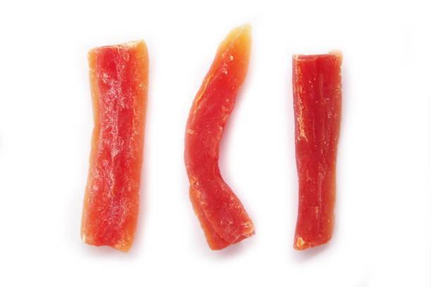 istock Dried and candied papaya slices isolated on white 1081971064