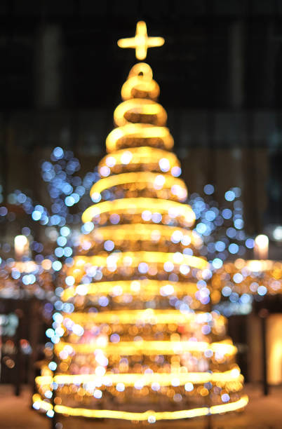 istock Christmas decoration background with golden and blue lights glowing 1081977566