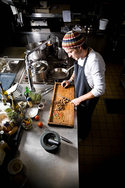istock Chef Cook Cutting and Preparing Food in Restaurant Kitchen 108197806