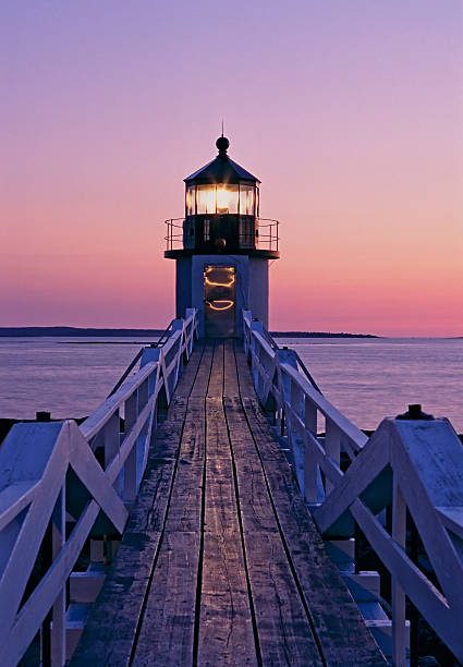 Beautiful sunset on the Marshal Point lighthouse stock photo