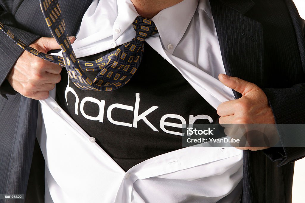 ビジネスマンコンピュータハッカーオープン彼のシャツ - 犯罪者のロイヤリティフリーストックフォト