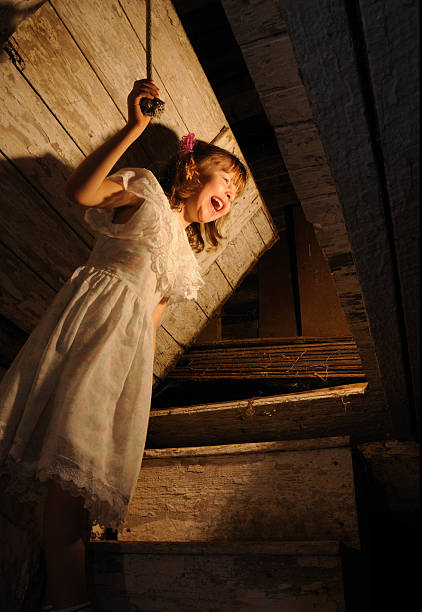 Mysterious Woman, Horror scene of scary ghost woman holding a doll at the dark corner of old Abandoned building