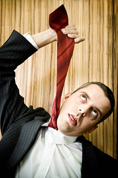 istock Businessman Hanging Himself with Neck Tie 108199121
