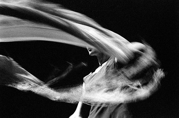 Motion Blur of Female Flamenco Dancer, Black and White stock photo