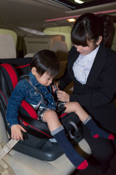 istock Mother and child going out by car 1081993258