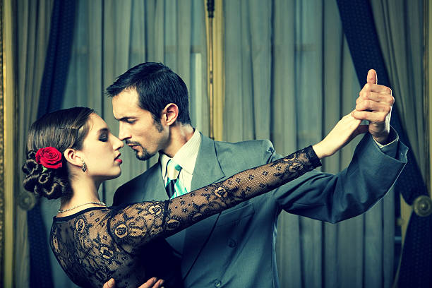 Young Couple Dancing Tango in Room  ballroom photos stock pictures, royalty-free photos & images