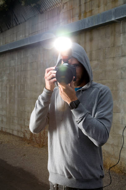 istock Young man taking a picture with professional camera 108199545