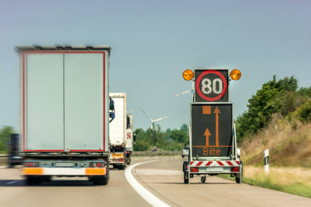 istock Digital traffic sign indicating a motorway construction site with the German word for 