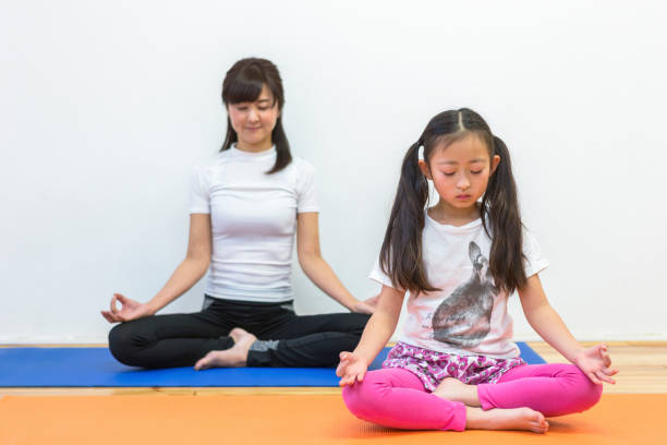 istock Parent and Child Yoga 1081997020