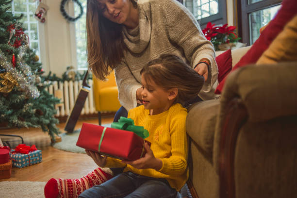 istock mother and daughter enjoying Christmas 1081997444