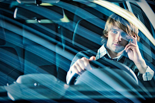 istock Businessman Talking on Mobile Phone and Driving 108199894
