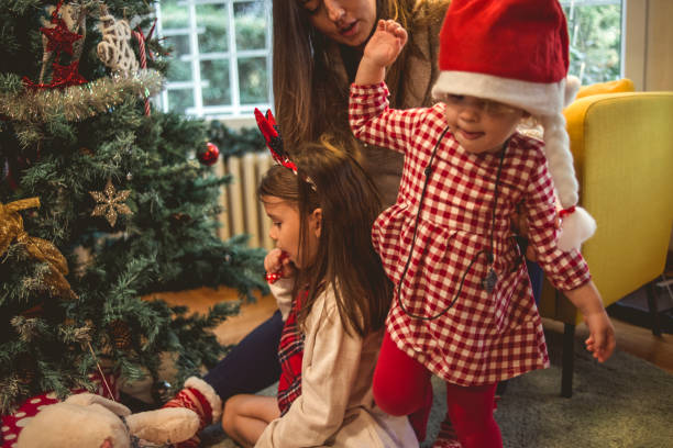 istock mother and daughter enjoying Christmas 1082002066