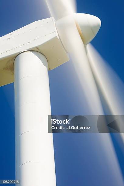A Closeup Of A White Windmill In Motion Stock Photo - Download Image Now - Close-up, Wind Turbine, Built Structure