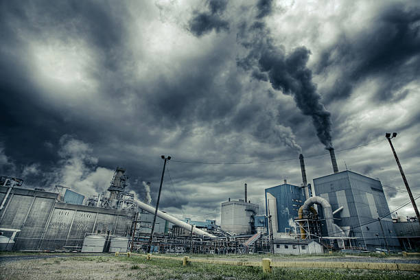 istock Factory smoke polluting air in a cloudy day 108200288