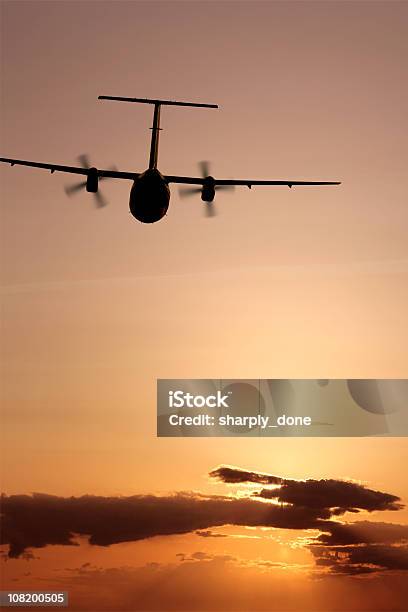 Propeller Airplane Flying At Sunset Stock Photo - Download Image Now - Propeller Airplane, Aerospace Industry, Air Vehicle