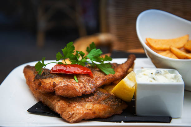 istock British Traditional fish and chips and tartar sauce 1082006796
