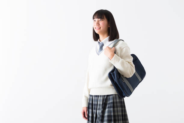 istock Schoolgirl with school bag 1082009602