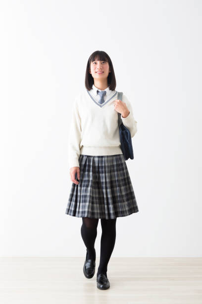 istock Schoolgirl with school bag 1082009608