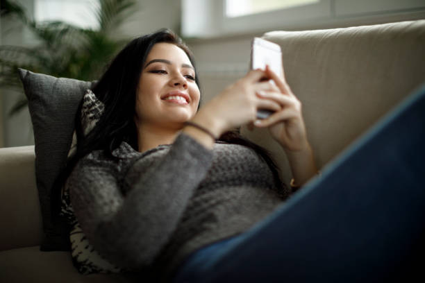 istock Young woman enjoying a relaxing weekend at home 1082011114