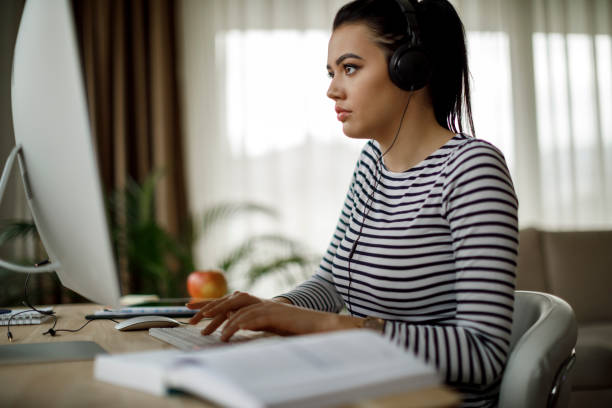 Young woman working at home