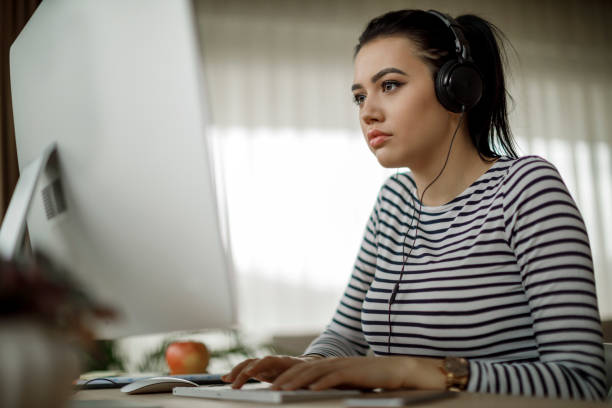 istock Young woman working at home 1082011456