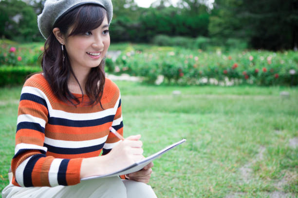 istock Woman painting in the park 1082012806