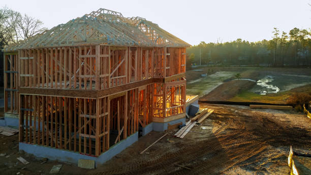 istock A stick built house under construction New build with wooden and beam framework. 1082014296