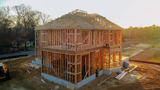 istock A stick built house under construction New build with wooden and beam framework. 1082014310