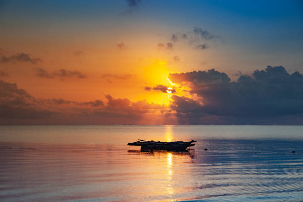 istock Colorful Sunrise on a Tropical Beach 1082014600