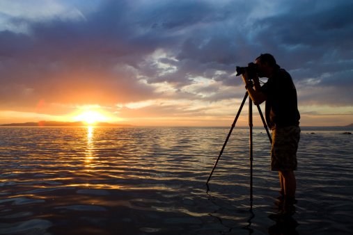 View of the evening landscape on the lake through the camera lens.