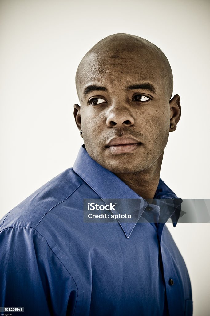 Young Man  Looking Over Shoulder Stock Photo