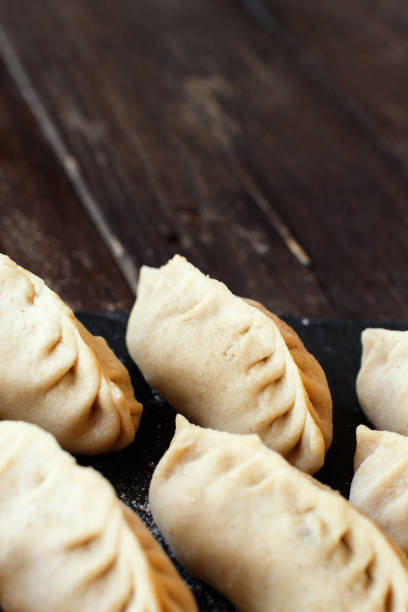 istock Preparation of dumplings manti 1082015610