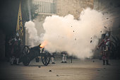 Vintage Canon Being Shot with Cloud of Smoke