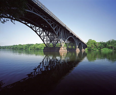 Vintage iron bridge spanning the Schuykill River in Philadelphia. Built 1897.