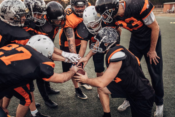 istock Football Players Huddling 1082017354