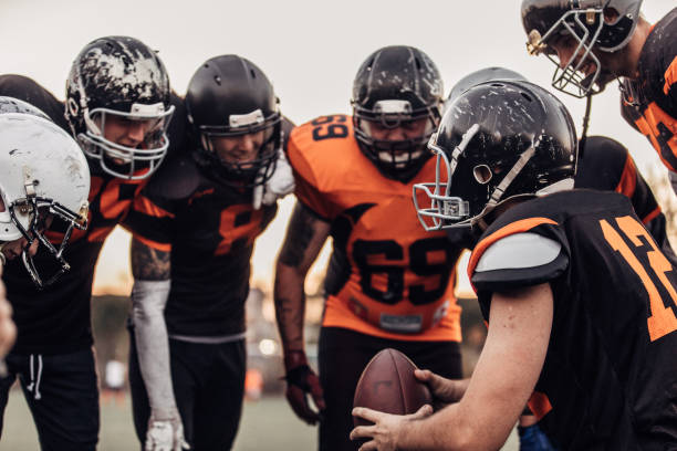 istock American Football Players Huddling 1082017886