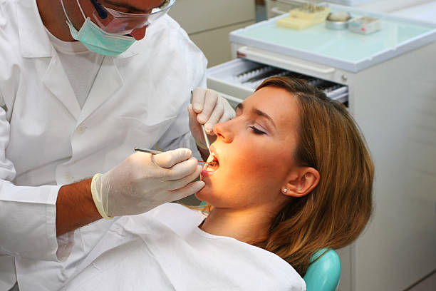istock Beautiful young women at the dentist 108201897