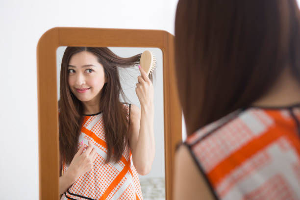 istock Women brushing their hair 1082020764