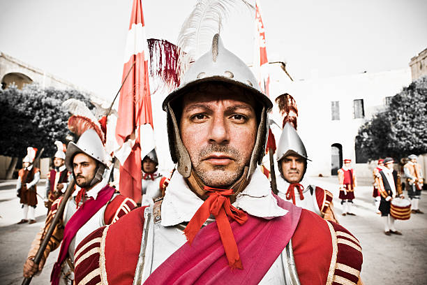 Knight Hospitaller Knight hospitallers Portrait Series in Fort Saint Elmo. Military re-enactment at Fort Saint Elmo, Valetta, Malta. Canon 1Ds Mark III knights of malta stock pictures, royalty-free photos & images