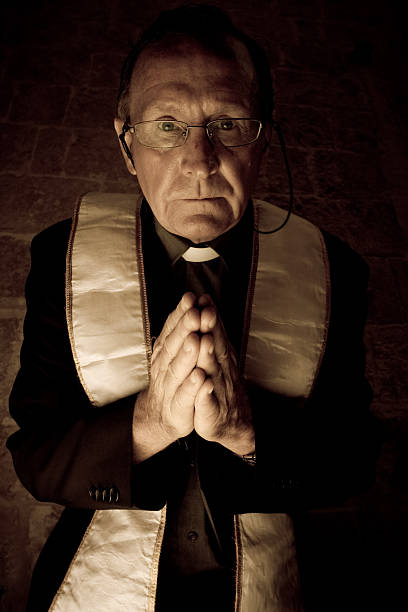 Priest praying. Shoot at Ref5esh in Malta 2008.