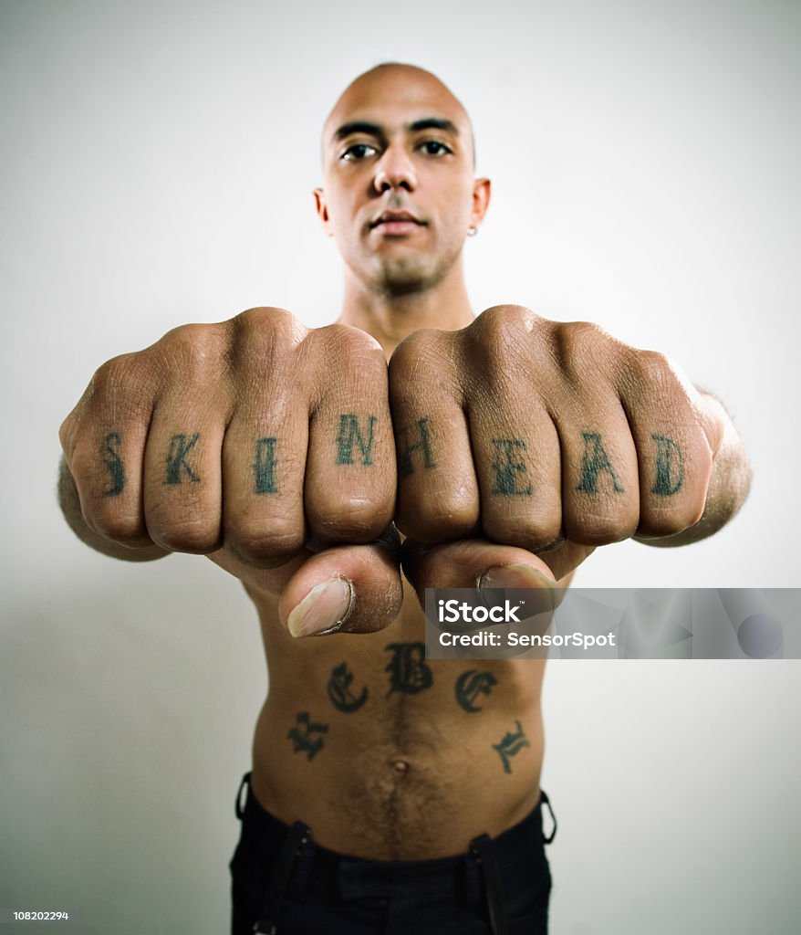Skinhead Showing Off Knuckle Tattoo Stock Photo - Download Image Now -  Tattoo, Knuckle, Completely Bald - iStock